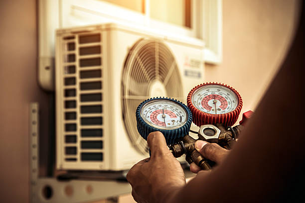 Professional Hvac Maintenance technician working in Reading, MA